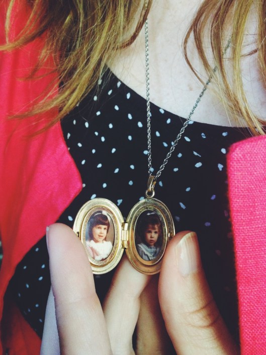 Raided grandma's jewelry box and found a locket with our pictures in it! 